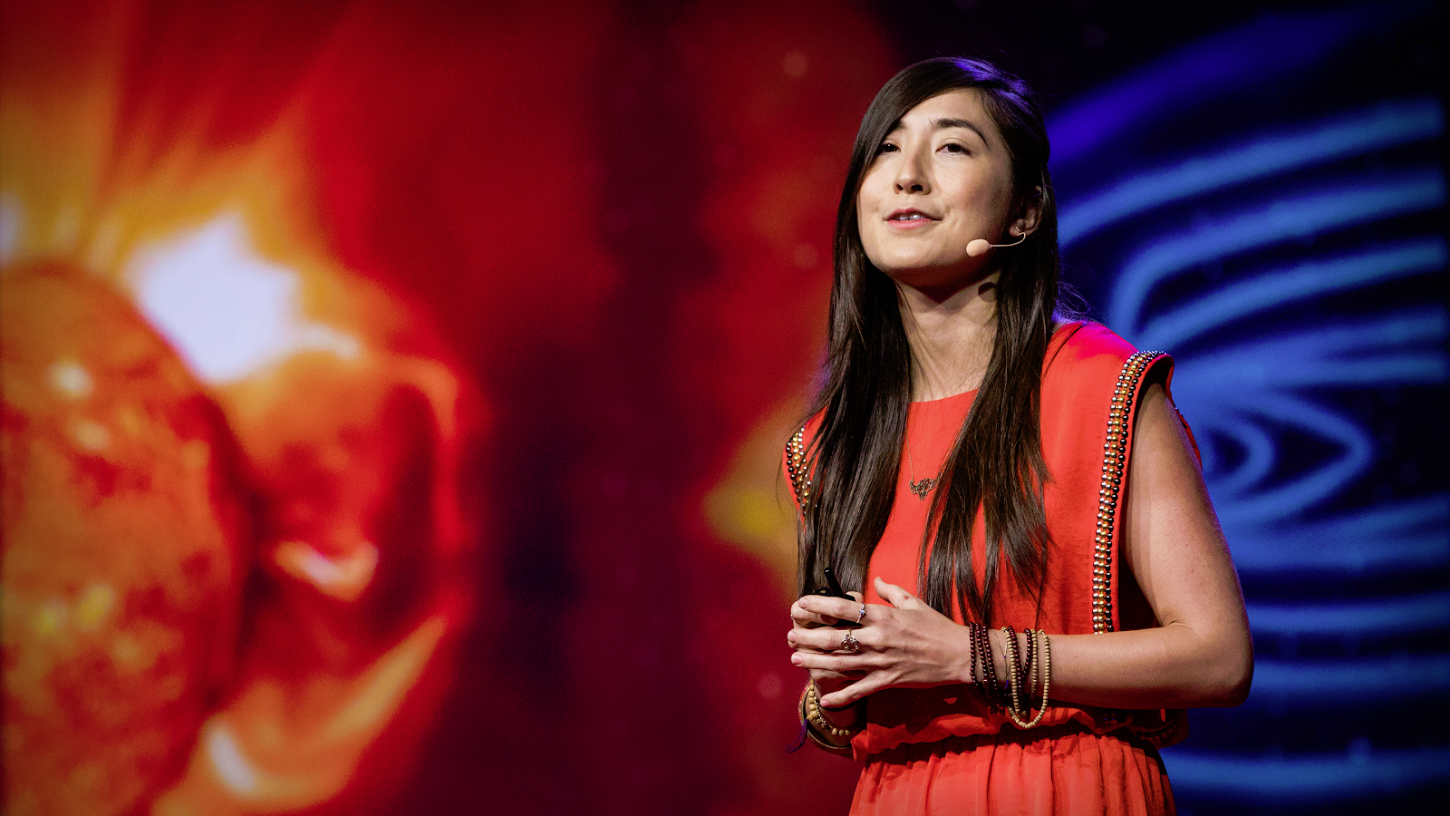 Miho Janvier giving a TED talk in 2017 about solar storms. Spot the headset mic! Credit: TED